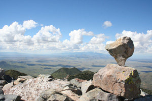 A balanced rock sits on top of the 8,354-foot summit of Dos Cabezas Mountains.