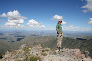 The author enjoys a clear view of Arizona, New Mexico and Mexico from the north summit of Dos Cabezas.